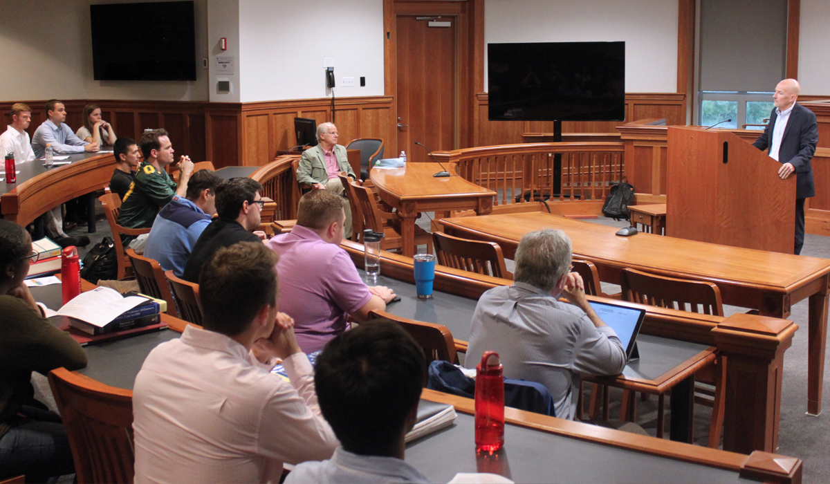 speaker addressing audience in the Slowinski courtroom