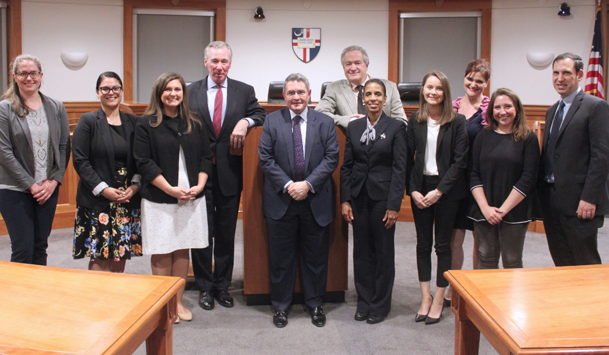 Group poses for photo in Slowinski courtroom