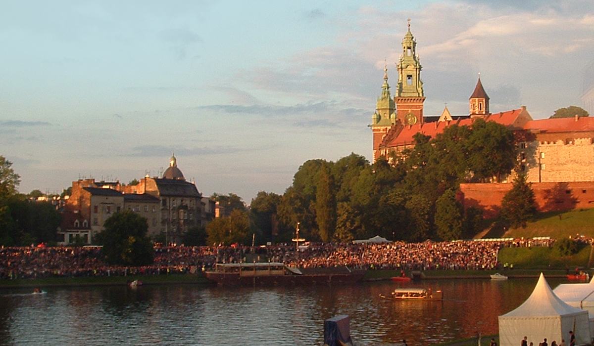 scenic photo of lake and buildings in Cracow, Poland