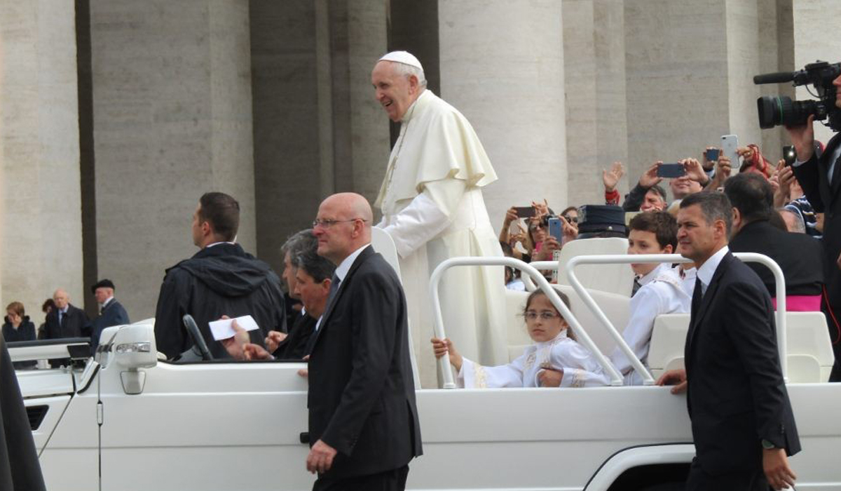 pope Francis in a car