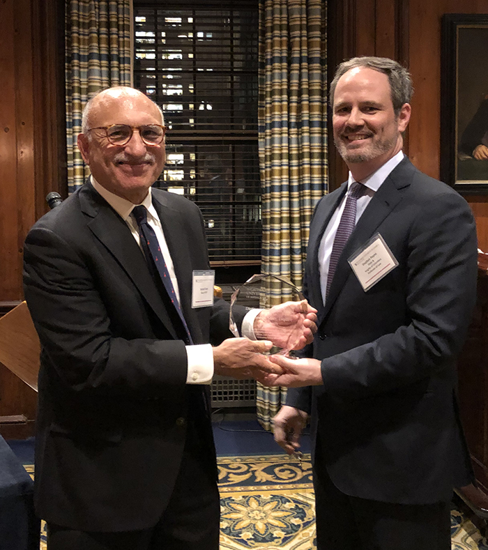 Richard M. Starr '79 receiving the Distinguished Alumni Award