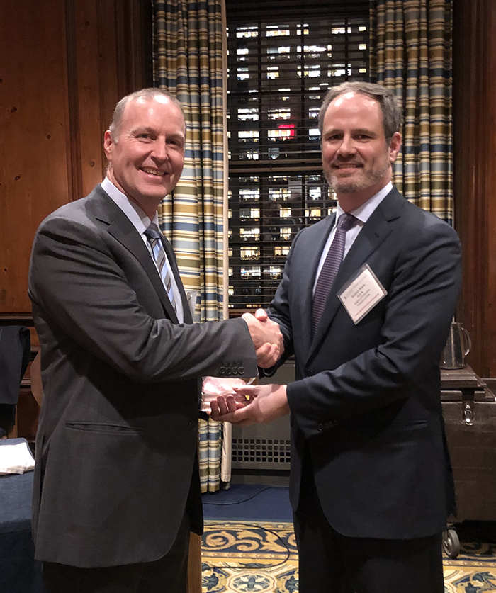 Chris R. Concannon '94 receiving the Distinguished Alumni Award