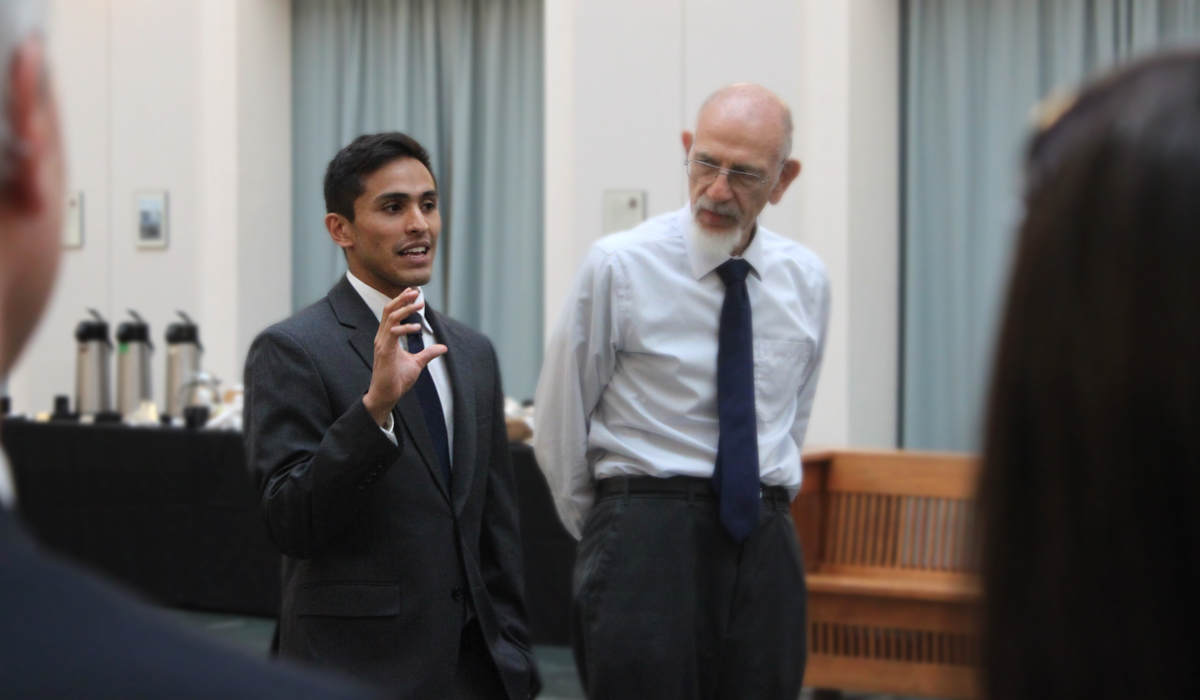 Nicolas Valderrama talking to visiting judges