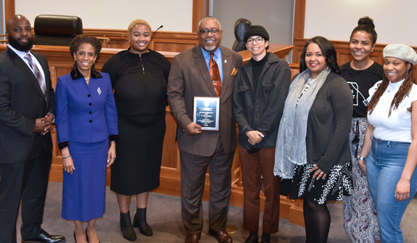 D. Michael Lyles poses for photo with some BLSA members