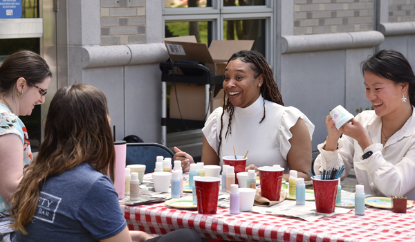 students talking outside