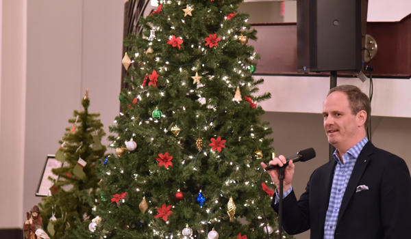 Dean Payne lighting the Christmas tree