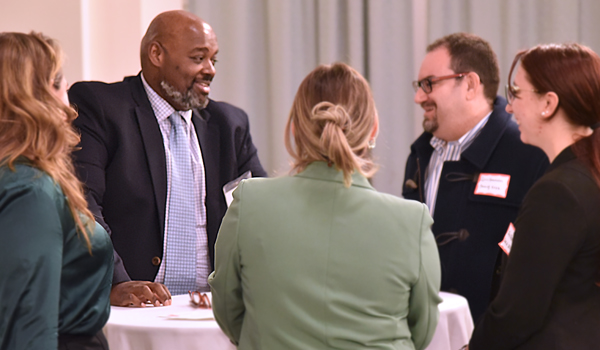 Jim Moye talking to law students