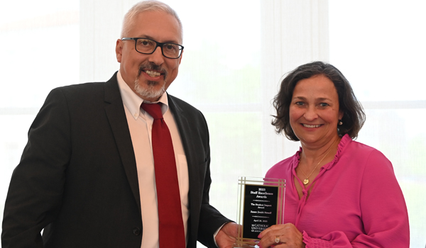 Susan Newell receiving Staff Excellence Award