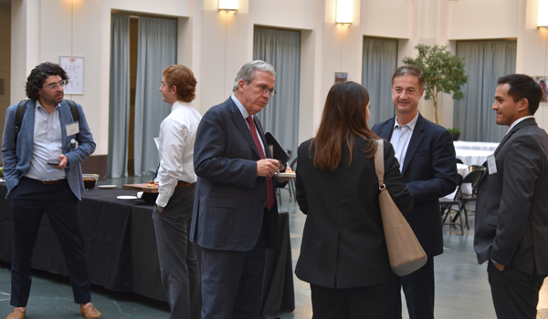 Guests and students talking