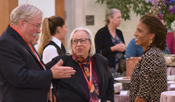 alumni talking to professor Jefferson