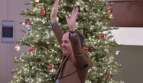 Dean Payne lighting the tree