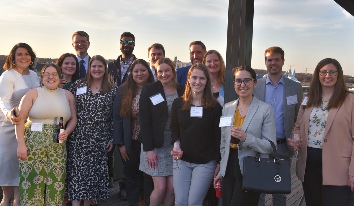 Alumni and students posed