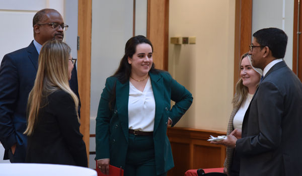 Two judges talking to law students