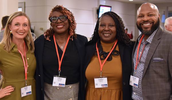 Four alumni at Cardinal Weekend