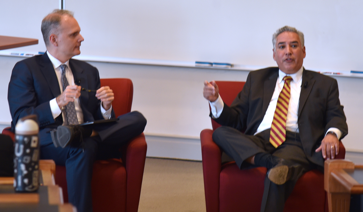 Professor Derek Webb and the Honorable Carlos F. Acosta