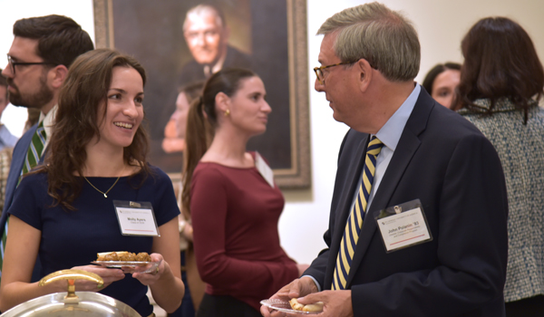 CRC Director John Polanin talking to a law student