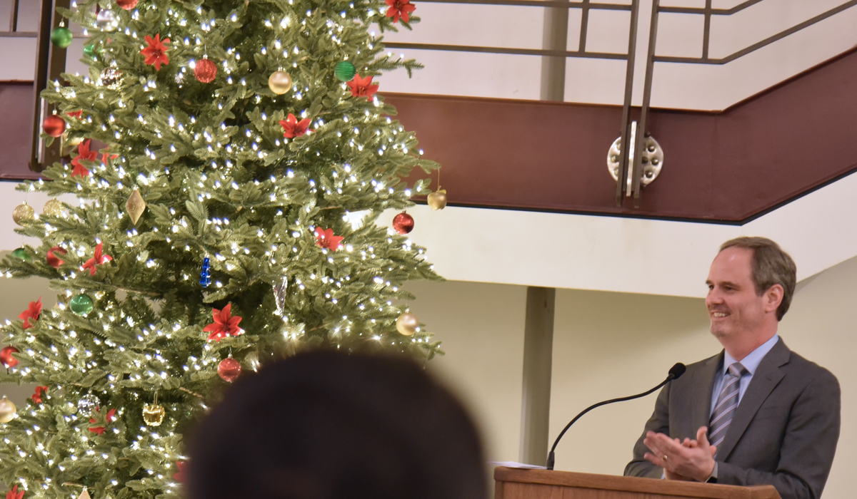 Dean Payne lighting the law school's Christmas Tree