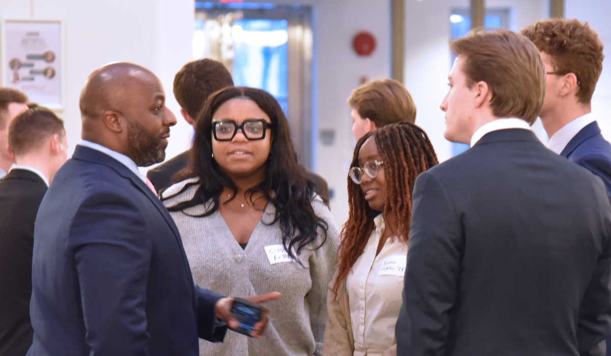 Alumni talking to law students