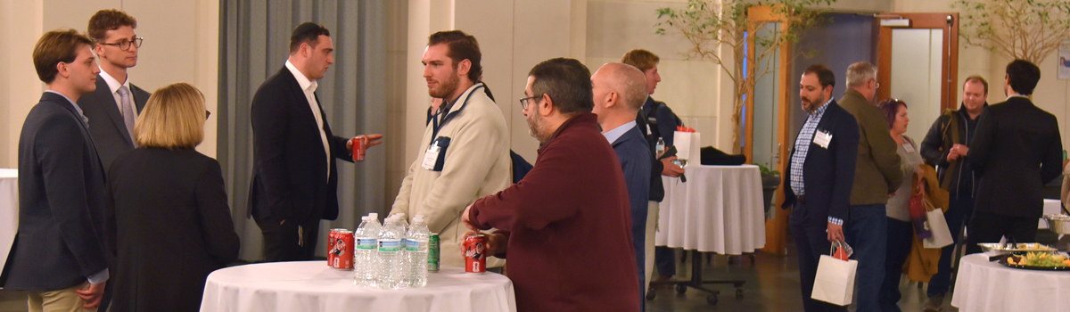 LTI alumni, faculty, and student networking reception at Catholic Law