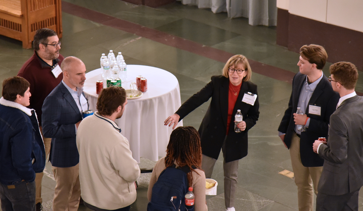 Catholic Law LTI alumni, students and faculty talking