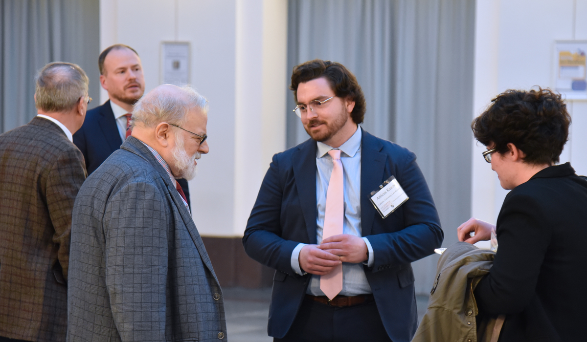 Catholis Law students talking to one of the moderators