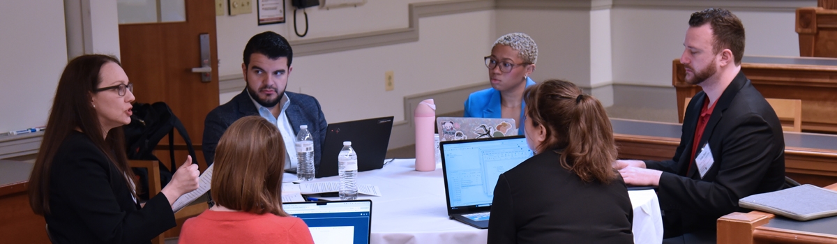 Judge Katherine A. Crytzer working with clerks