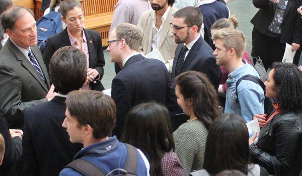 Justice Alito talking to students in the law school atrium