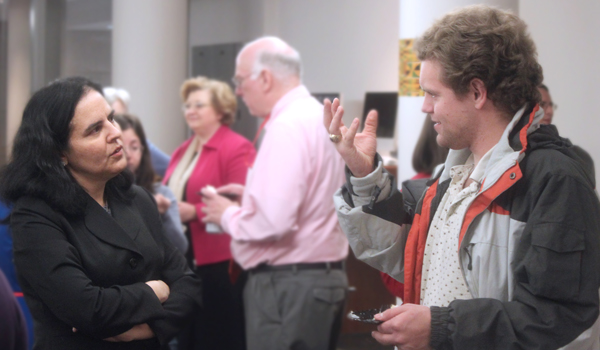 Professor Silecchia talking to a student