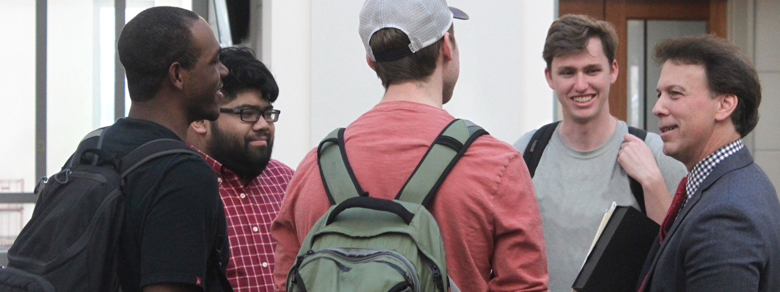 Students talking to Professor Harmon