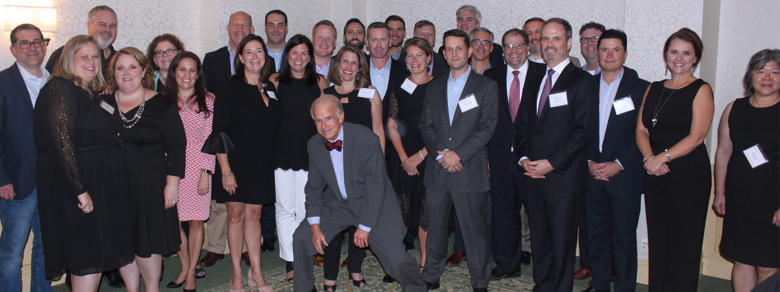 group of alumni posing for a photo