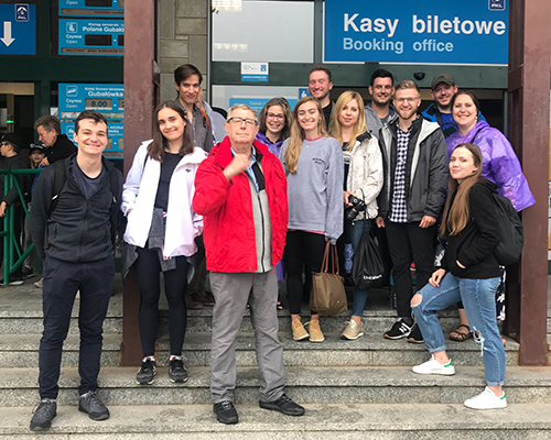 group of students at train station in Poland