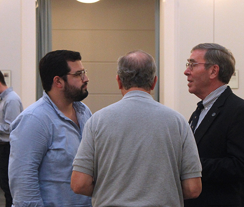 students talking in the atrium